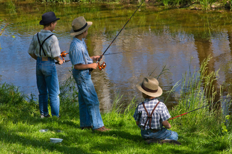 Amish Boys Fishing, Lancaster County, Pennsylvania, USA - Art Wolfe