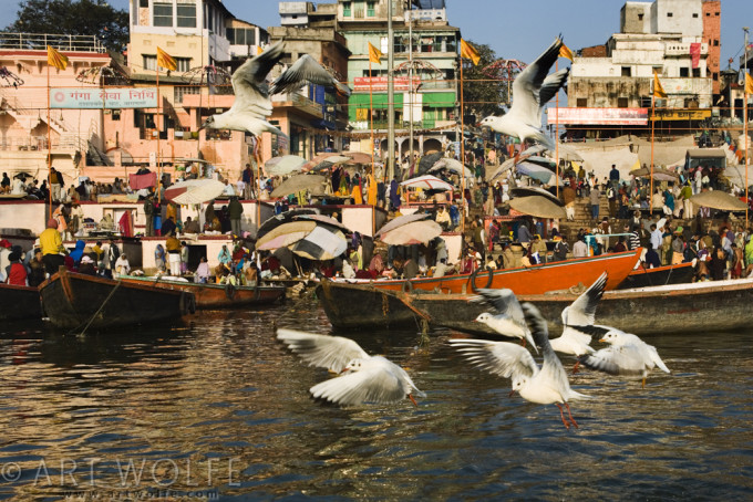 Along the waterfront of Varanasi, an ancient city on the Ganges river, the timeless tradition of gathering and bathing in the sacred waters is still prevalent. The Ganges, which originates in the nearby Himalaya, is believed to transport water that purifies the soul for the multitudes of Hindus that live along its course.