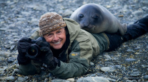 Art wolfe and a Southern elephant seal weaner, South Georgia Island