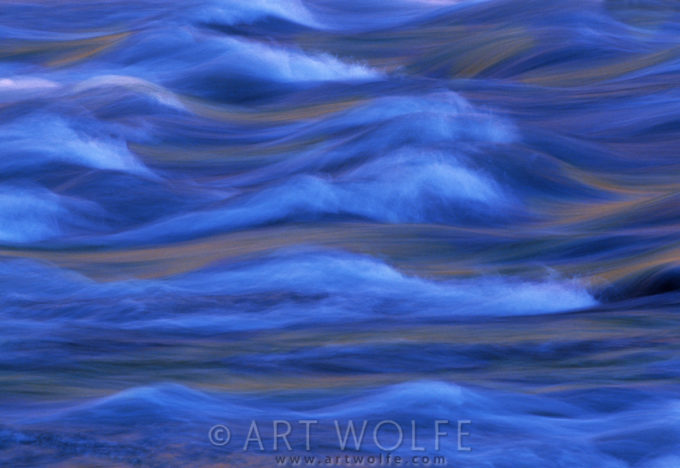 Another long exposure of the rapids along the Queets River, with the reflection of the sky and trees above adding subtle shades to the blue of the river waters.
